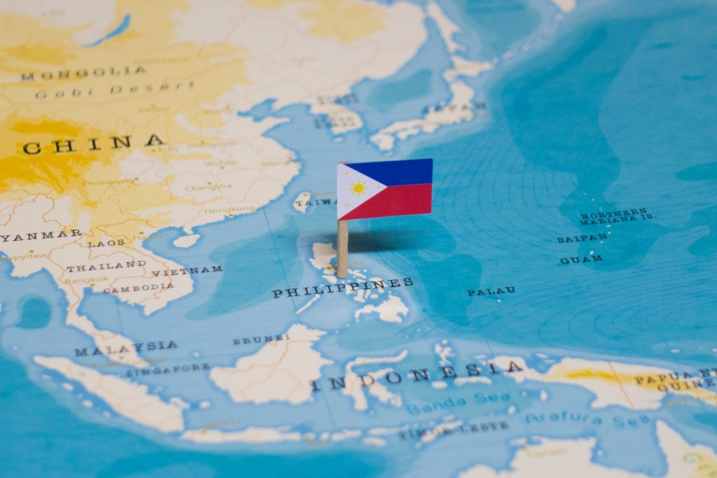 Map with a mini flag pin on the Phillipines