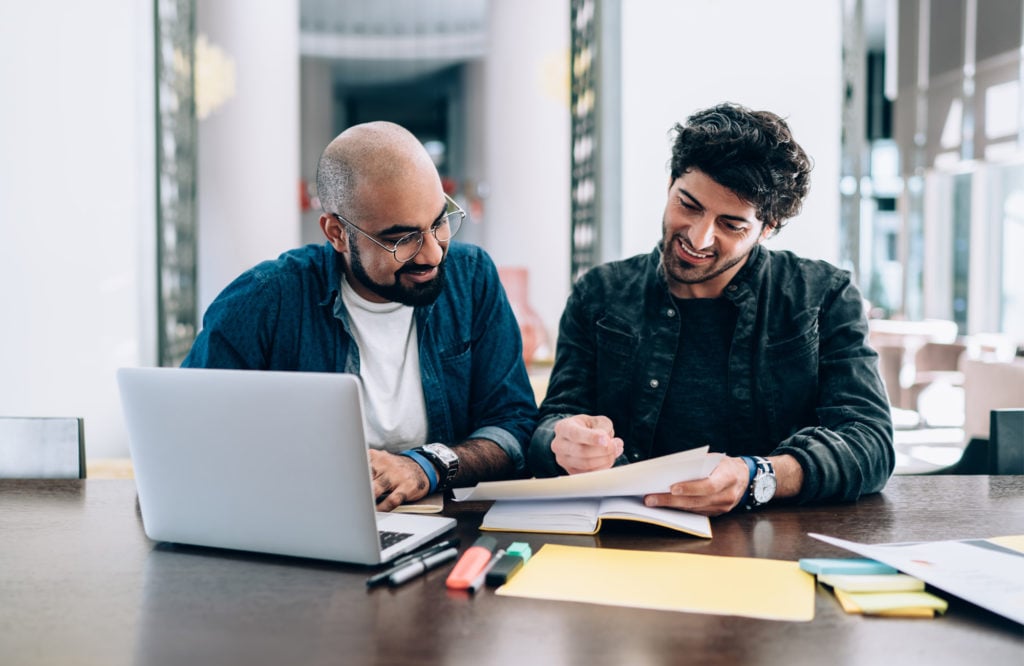 business owners looking up swift codes