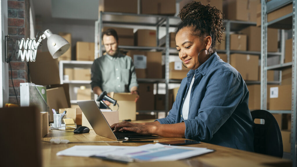 woman managing her small business cash flow management