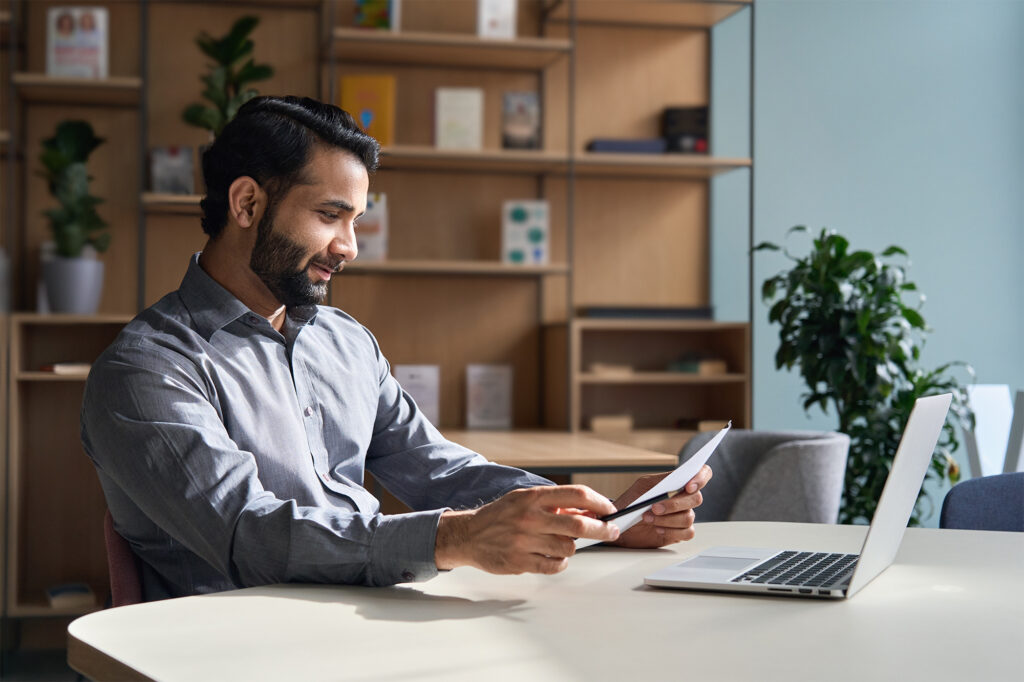 man making a bank transfer with credit card