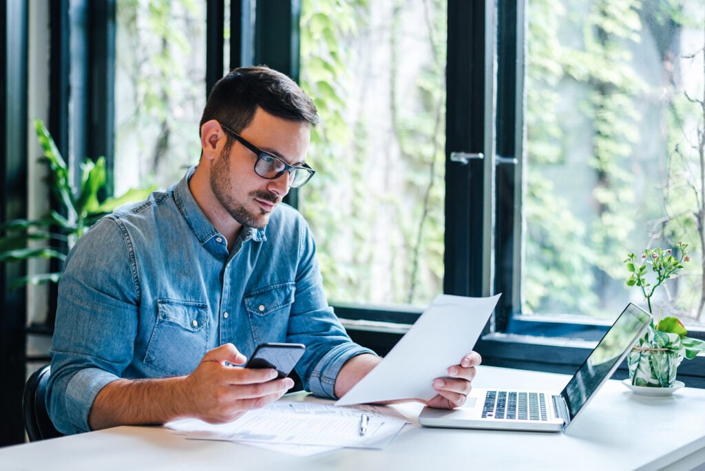 man learning about swift codes and iban
