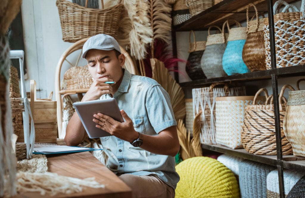 man looking into wire transfer safety